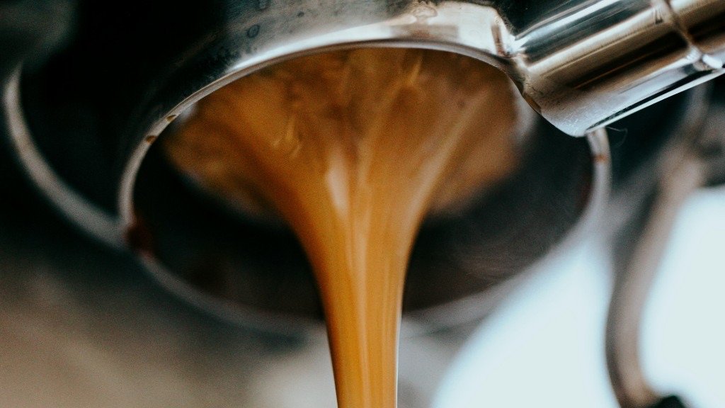Espresso pouring from a portafilter.